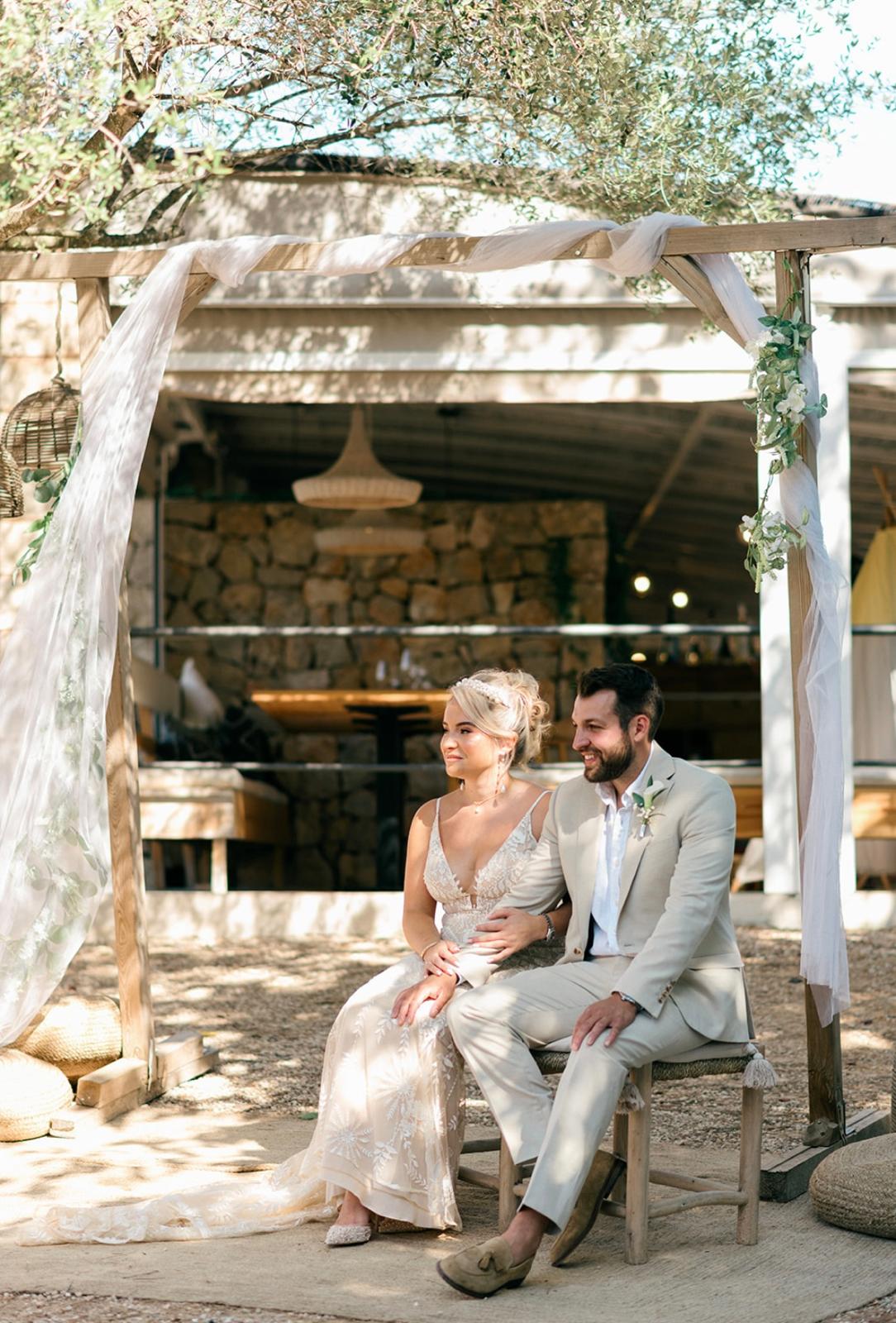 Family vow renewal ceremony on beach at sunset